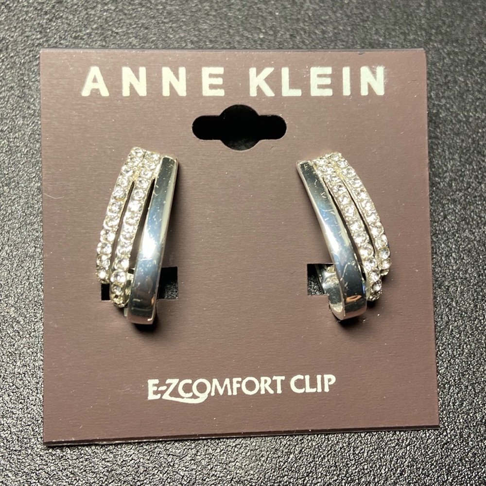 Clip on earrings. Missing one gem. See photos.